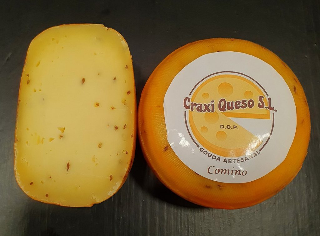 Raw milk cow cheese with cumin. Artisan Gouda Cheese with cumin seeds Price €9.60
