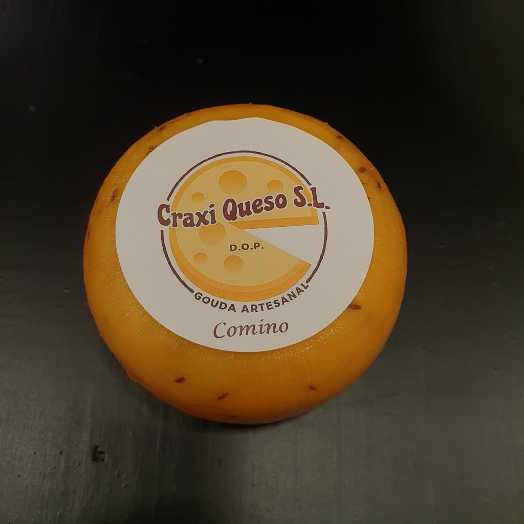 Artisanal Dutch cheese with cumin seeds. Raw cow's milk Gouda cheese Price €9.60
