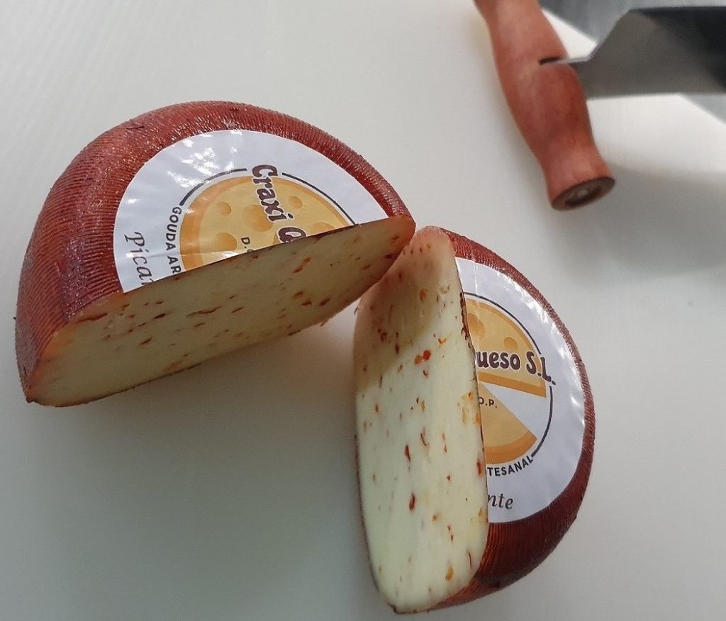 Spicy raw milk cow cheese with chilies. Spicy Artisan Gouda Cheese with a Wheel Weight of ±0.50 kg Price €9.60