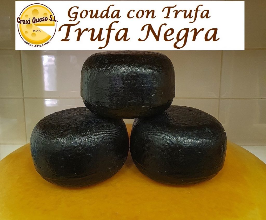 Miniature Gouda cheeses with black truffle