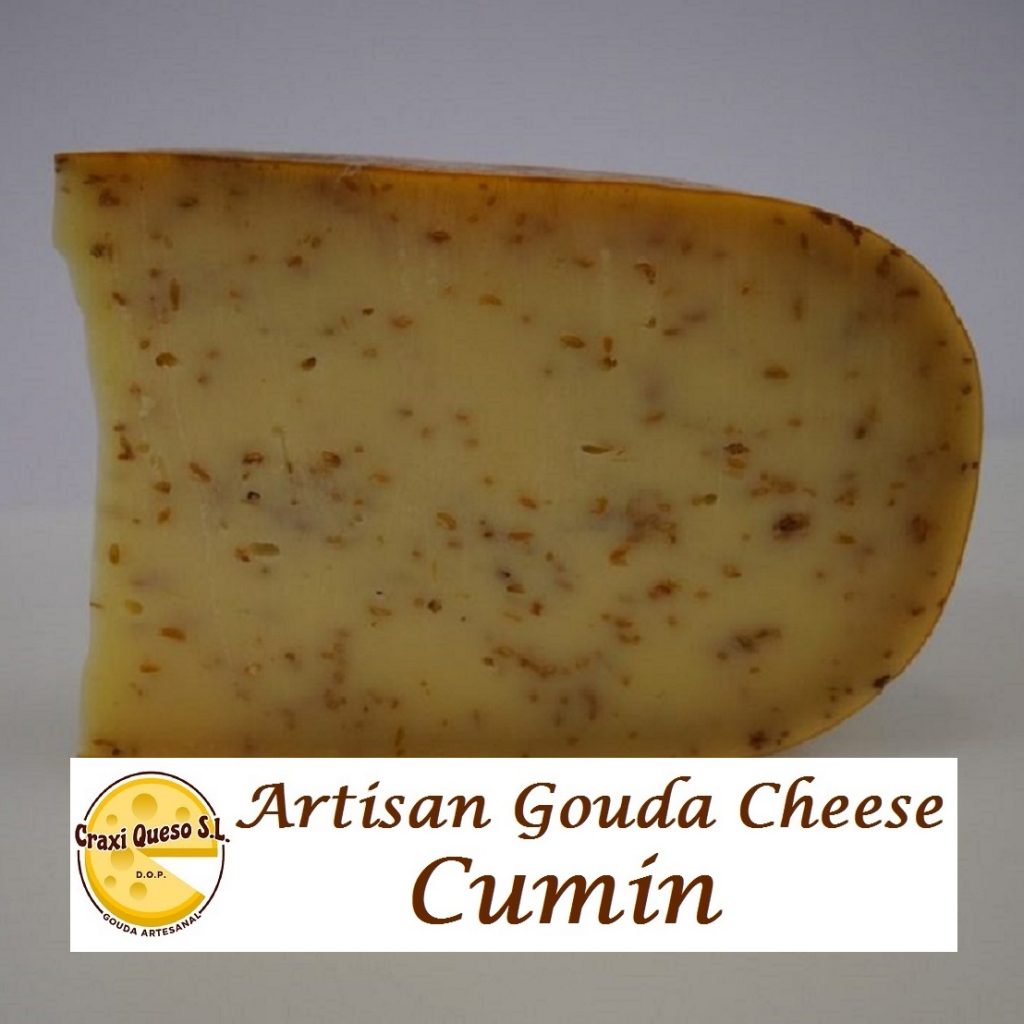 Gouda with cumin. Artisanal Dutch Gouda cheese with cumin seeds, made with raw cow's milk. Sold at Craxi Queso, Spain. Price: €22.60/kg.